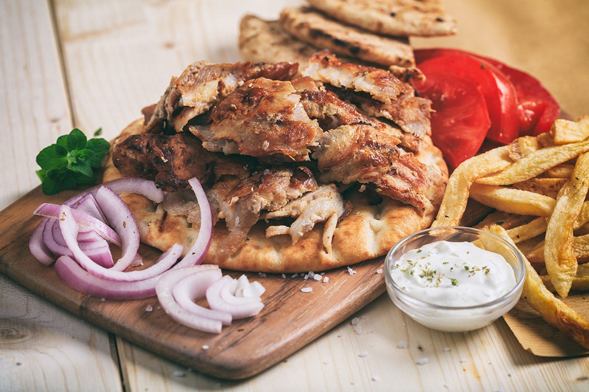 Chicken Souvlaki on wooden board